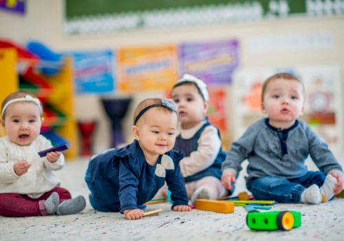 A group of babies playing at Infant Daycare in Peoria IL