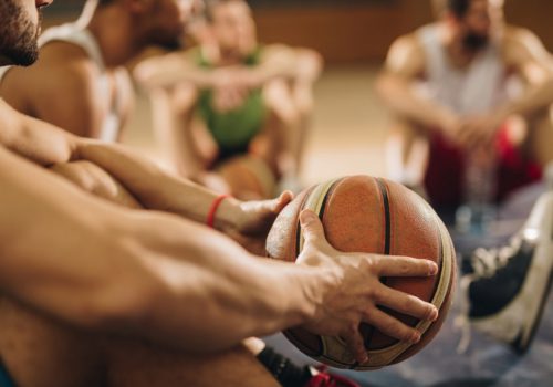 Photo of a Basketball Team Before a Match
