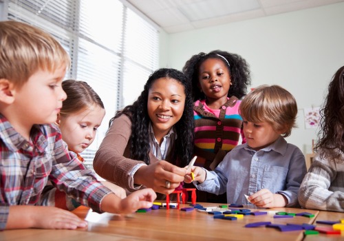 The instructor teaching kids at Pre-K in Peoria IL
