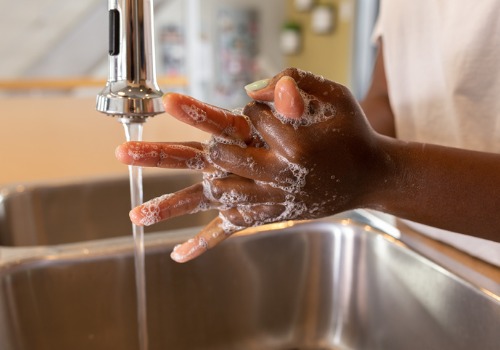 Child Washing Hands at a Daycare in Peoria IL