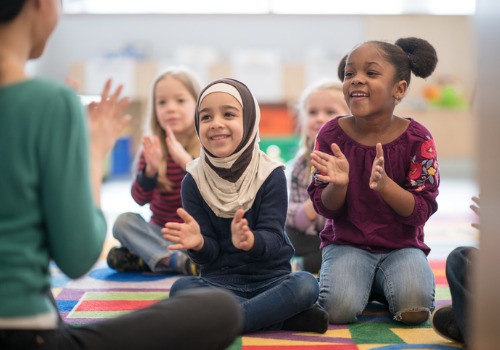 Toddlers sing and clap together at PALS, the Best Pre-K in Peoria County IL