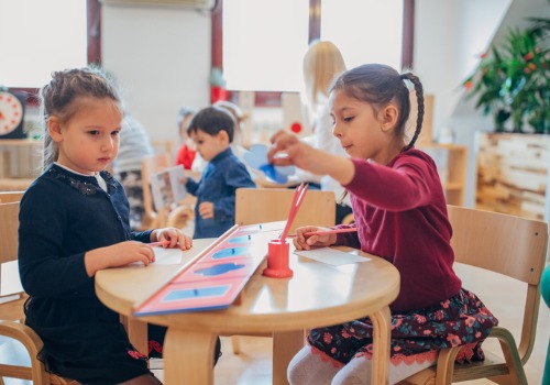 Children participate in a learning activity at PALSChildcare Development Center for East Peoria IL residents